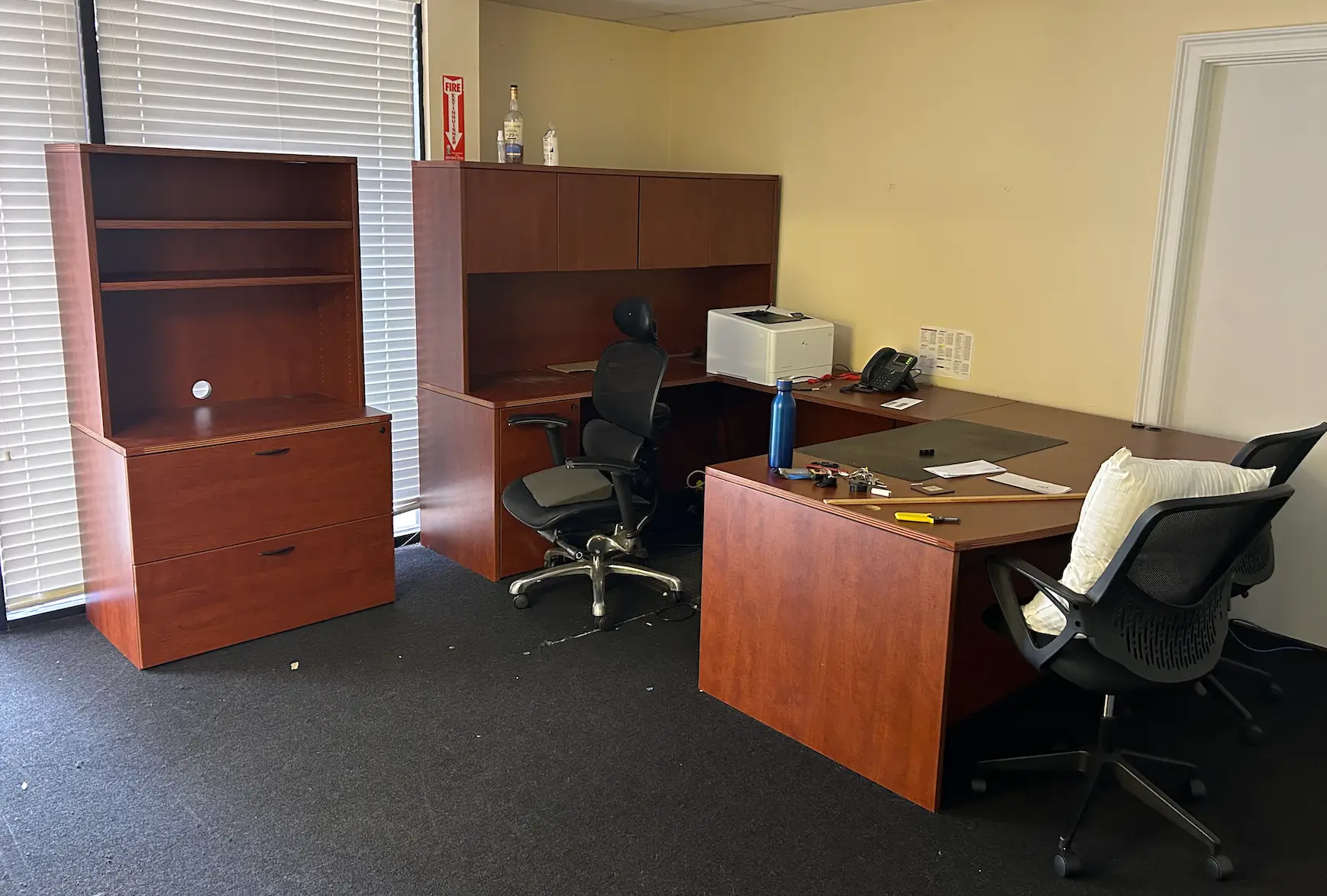 Commercial junk removal with office furniture, desks, and equipment being cleared in South Florida